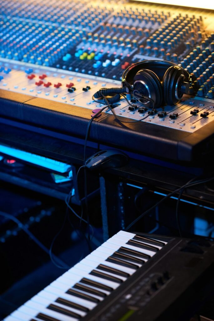 Headphones on music studio keyboard